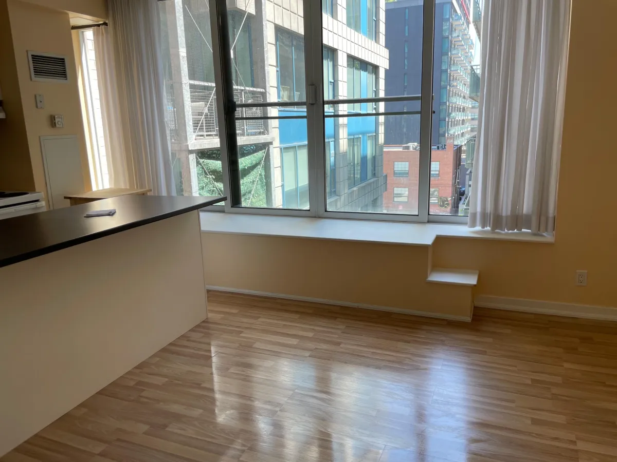 Condo living area after move-out cleaning